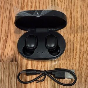 Black Wireless Earbuds with Charging Case and USB Cord